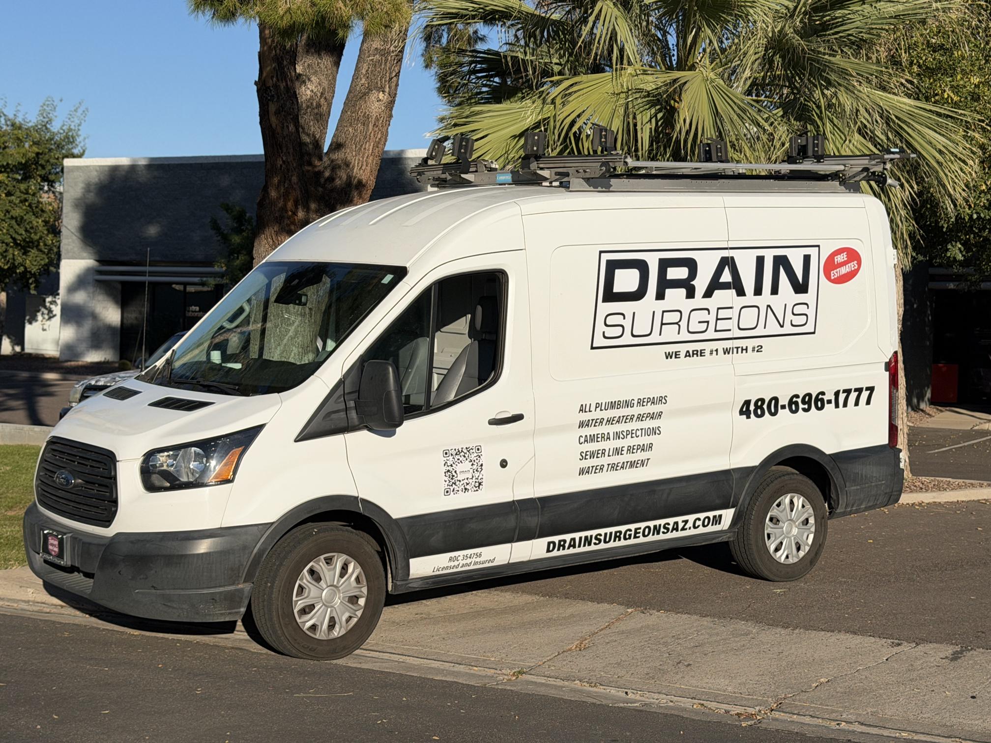 Drain Surgeons branded Ford Transit service van offering free estimates in Phoenix